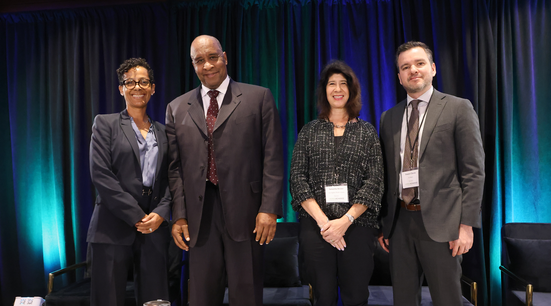 Renata Simril, James T. Butts, Samantha Bricker and Ernesto Chaves on stage after the Monday Plenary